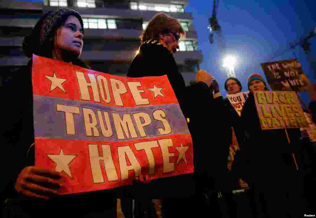 Anti-Trump protesters gather during a protest against the inauguration of U.S. President-elect Donald Trump, in Berlin, Jan. 20, 2017.