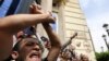 FILE - Journalists protest against restriction on the press and to demand the release of detained journalists, in front of the Press Syndicate in Cairo, Egypt May 4, 2016. 