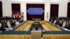 U.S. President Barack Obama (back to camera) participates during the ASEAN Summit at the Peace Palace in Phnom Penh, November 19, 2012. 