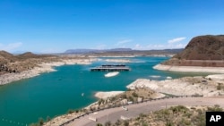 FILE - Low water levels are seen at Elephant Butte Reservoir near Truth or Consequences, N.M., on July 10, 2021.