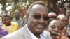FILE - In this Dec. 23, 2014 file photo, General David Sejusa returns to the capital Kampala, Uganda. A military general who opposes Uganda's longtime president was arrested ahead of presidential elections next month, his lawyer said Jan. 31, 2016.