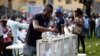 FILE - A party delegate casts his vote during the All Progressives Congress (APC) primary election to choose a governorship candidate for Nigeria's Lagos state, at Onikan stadium in Lagos, Dec. 4, 2014.