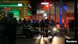 Policija u blizini mesta gde se odigrala pucnjava (Foto: Reuters/Chris Helgren)
