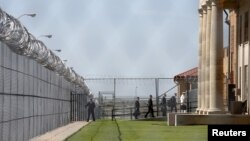 In pushing criminal justice reform, U.S. President Barack Obama (not shown) and aides visit El Reno Federal Correctional Institution in Oklahoma, July 16, 2015. 