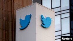FILE PHOTO: A Twitter logo is seen outside the company headquarters in San Francisco