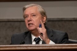 Senate Judiciary Committee Chairman Lindsey Graham, R-S.C., asks questions to former FBI Director James Comey, during an oversight hearing to examine the Crossfire Hurricane Investigation, Sept. 30, 2020, on Capitol Hill in Washington.