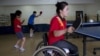 FILE - Disabled North Korean table tennis players practice at the Taedonggong Cultural Center for the Disabled in Pyongyang, North Korea.