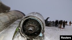 The wreckage of an airplane is seen after a crash in Deh Yak district of Ghazni province, Afghanistan January 27, 2020. NO RESALES. NO ARCHIVES.