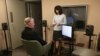 FILE - A research audiologist conducts a hearing test on a patient at the Phonak US Audiology Research Center in Warrenville, Ill., Dec. 18, 2014.