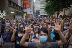 Protesters rally against China's new national security law for Hong Kong, in Hong Kong, July 1, 2020.