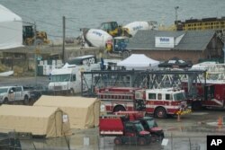 Kendaraan darurat dan operasi pemulihan terlihat di dekat muara Sungai Anacostia di Sungai Potomac dekat Bandara Nasional Ronald Reagan Washington, 31 Januari 2025.