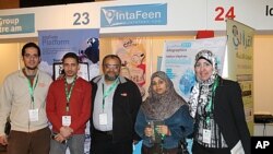 Adel Youssef (middle) and the team behind the IntaFeen application, Cairo, Egypt, March 20, 2012.