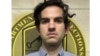 Asif William Rahman, yang bekerja untuk pemerintah AS, ditahan oleh FBI di Kamboja dengan tuduhan membocorkan informasi rahasia terkait rencana Israel untuk menyerang Iran. (Guam Department of Corrections via AP)