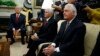 President Donald Trump listens to a question during a meeting with Finnish President Sauli Niinisto in the Oval Office of the White House in Washington, Aug. 28, 2017. From left are, Trump, Vice President Mike Pence, and Secretary of State Rex Tillerson.