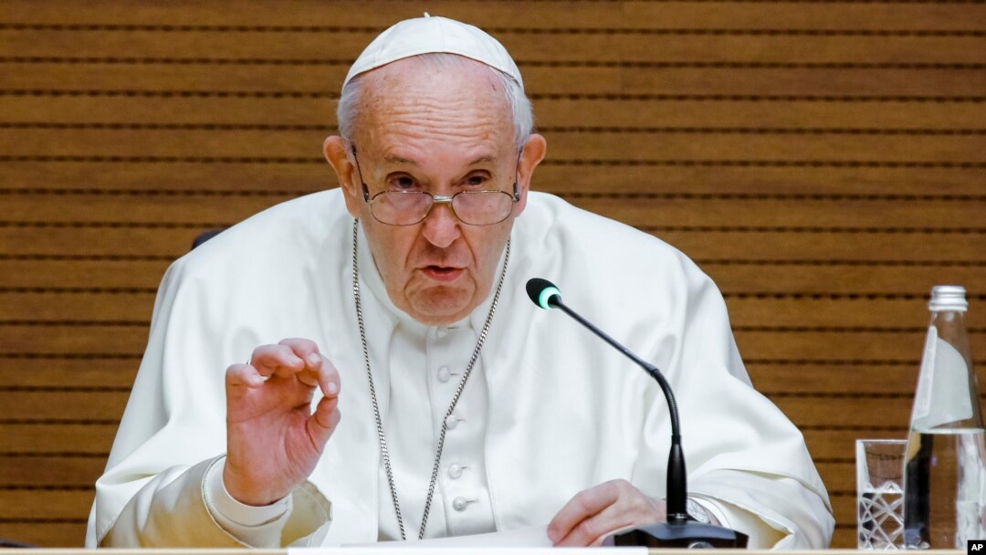FILE - Pope Francis speaks during a presentation at the Jesuits' General Congregation Hall in Rome, Dec. 13, 2019. 