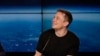 FILE- South Africa-born Elon Musk, founder, CEO, and lead designer of SpaceX and creator of electric car making Tesla, speaks at a news conference after the Falcon 9 SpaceX heavy rocket launched successfully from the Kennedy Space Center in Cape Canaveral