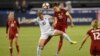 France midfielder Camille Abily, left, battles for the ball against United States midfielder Carli Lloyd, right, during the first half of a SheBelieves Cup women's soccer match, March 7, 2017, in Washington.
