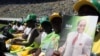 Supporters of Zimbabwean President and Zanu pf leader President Robert Mugabe are seen at his last campaign rally in Harare, July, 28, 2013.