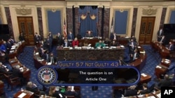 In this image from video, the final vote total of 57-43, to acquit former President Donald Trump of the impeachment charge, incitement of insurrection, in the Senate at the U.S. Capitol in Washington, Saturday, Feb. 13, 2021. (Senate Television via…