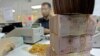 Cashless Dreams Feature Motorbike Bankers, E-wallets in Vietnam