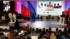FILE - Indonesia's presidential candidate Joko Widodo, left, speaks beside his vice presidential candidate Ma'ruf Amin during a televised debate with his opponents Prabowo Subianto and his vice presidential candidate Sandiaga Uno in Jakarta, Indonesia, Jan. 17, 2019.