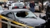 The vehicle of the alleged shooter is pictured at one of crime scenes after a series of drive-by shootings in the Isla Vista section of Santa Barbara May 24, 2014.
