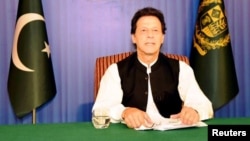 Pakistan's Prime Minister Imran Khan speaks to the nation in his first televised address in Islamabad, Pakistan, Aug. 19, 2018. 