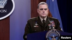 FILE - Joint Chiefs of Staff Chairman General Mark Milley holds a news briefing at Pentagon in Arlington, Virginia, Aug. 18, 2021. 