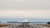 A plane is taking off at Reagan Washington National Airport outside Washington, D.C. (Photo by Diaa Bekheet)