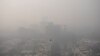 Kabut asap menutupi gedung-gedung pencakar langit di New Delhi, India, Kamis, 4 November 2020.