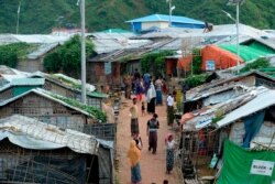 Rohingya people are seen at a camp in Teknaf, Bangladesh, Aug. 21, 2019.