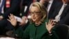 U.S.Secretary of State Hillary Clinton responds to criticism from Sen. John McCain (R-AZ) (not in photo) on the September attack on U.S. diplomatic sites in Benghazi, Libya during a hearing held by the U.S. Senate Foreign Relations Committee on Capitol H
