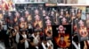 Activists display portraits of people who killed themselves by self-immolation take part in a rally to support Tibet, Taipei, Taiwan, March 10, 2013.