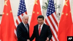 2013年12月4日，中國國家主席習近平與時任美國副總統拜登在北京人民大會堂會面。 （美聯社照片）