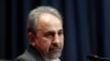 FILE - Mohammad Ali Najafi, then mayor of Tehran, gives a press conference, in Tehran, Iran. 