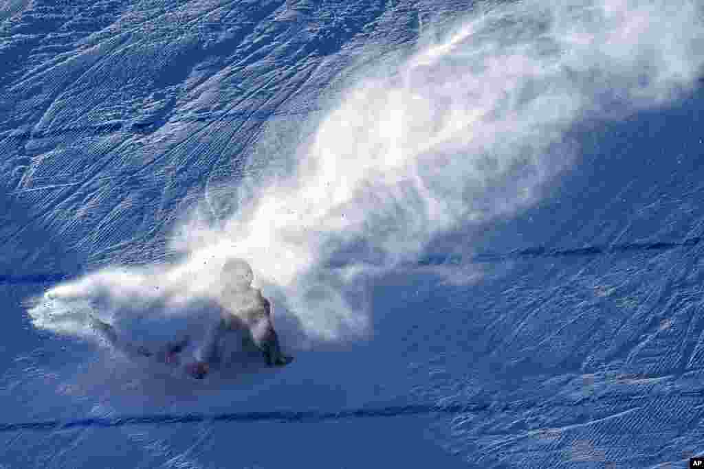 Xiong Shirui of China crashes during the Women's Snowboard Big Air at the 9th Asian Winter Games in Yabuli in northeast China's Heilongjiang province.