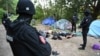 Pripadnici Ministarstva unutrašnjih poslova Srbije tokom akcije "Plaža", usmerene ka otkrivanju iregularnih migranata, u mestu Srpski Krstur u opštini Novi Kneževac, u Vojvodini, Srbija, 4. jula 2021. (Foto: MUP Srbije)