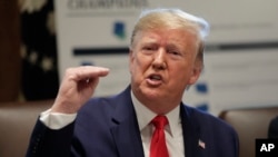 President Donald Trump speaks during a Cabinet meeting at the White House, Oct. 21, 2019, in Washington.