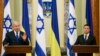 Israeli Prime Minister Benjamin Netanyahu, left, gestures while speaking during his and Ukrainian President Volodymyr Zelenskiy, joint news conference following their talks in Kyiv, Ukraine, Aug 19, 2019. 