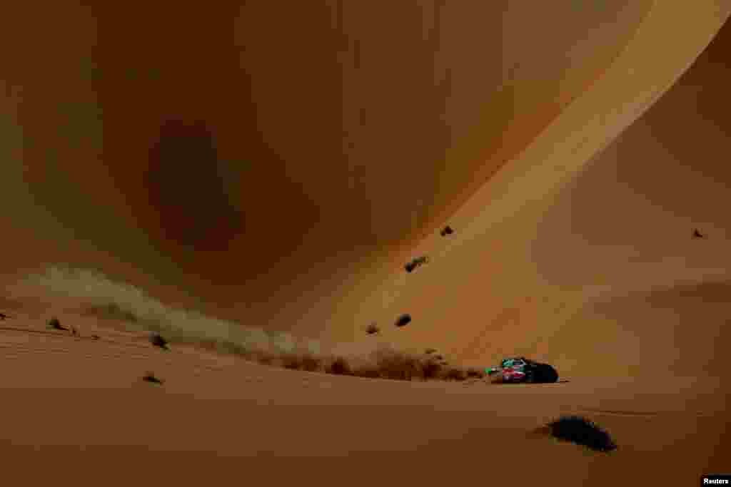 Overdrive Racing's Yazeed Al-Rajhi and Timo Gottschalk compete in the Dakar Rally stage 10 between Haradh and Shubaytah, Saudi Arabia.