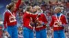 Gold medallists from team Russia kiss celebrating their victory at the women's 4x400 meters relay during the World Athletics Championships in Moscow August 17, 2013.