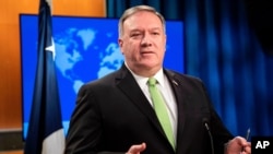 Secretary of State Mike Pompeo speaks during a press briefing at the State Department on Wednesday, May 20, 2020, in Washington. (Nicholas Kamm/Pool Photo via AP)