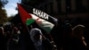 FILE - Protesters in Madrid, Spain, take part in a demonstration in support of Western Sahara's independence.