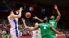 FILE - Nigeria's Ike Diogu competes in a FIBA World Cup, Sept. 4, 2019, against South Korea.