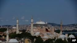 An aerial view of the Byzantine-era Hagia Sophia, one of Istanbul's main tourist attractions in the historic Sultanahmet district of Istanbul, Saturday, April 25, 2020. The 6th-century building is now at the center of a heated debate between…