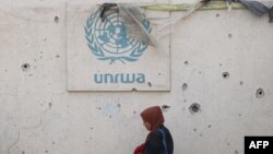 资料照片：加沙地带南部拉法城内联合国近东救济工程处的被毁墙壁。(UNRWA)(2024年5月28日)