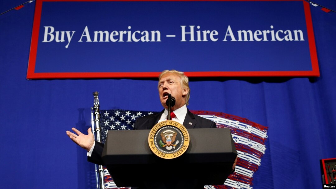 U.S. President Donald Trump speaks before signing an executive order directing federal agencies to recommend changes to a temporary visa program used to bring foreign workers to the United States to fill high-skilled jobs during a visit to Snap-On Inc., a
