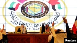Kuwait's Foreign Minister Sabah Al Khalid Al Sabah participates in a news conference with Secretary-General of the Gulf Cooperation Council (GCC) Abdullatif bin Rashid Al Zayani, following the annual summit of GCC, in Kuwait City, Kuwait, Dec. 5, 2017.