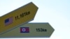 Destination signs to North Korea's capital, Pyongyang, and the United States are seen at the Imjingak Pavilion in Paju, near the border with North Korea, South Korea, Jan. 14, 2022.