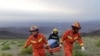 Rescue workers work at the site of the accident where extreme cold weather killed participants of an 100-km ultramarathon race in Baiyin, May 23, 2021.